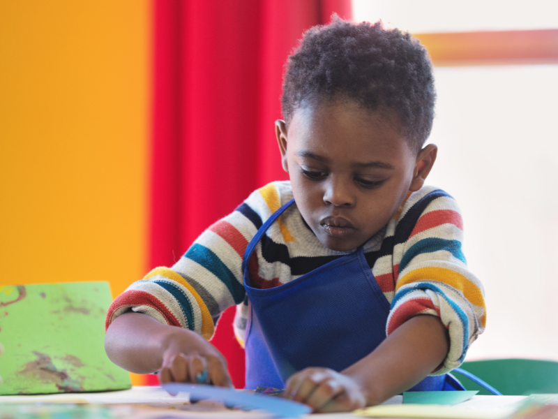 Boy doing arts and crafts
